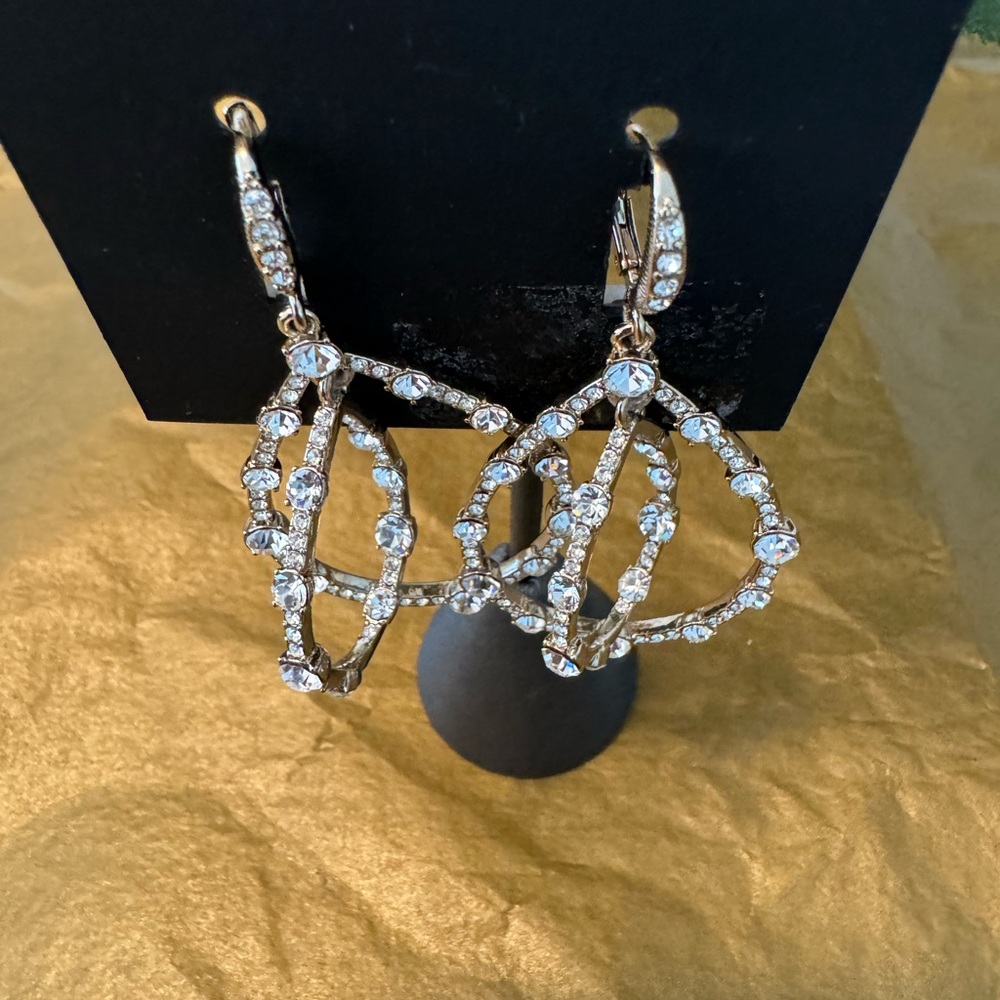 Gold tone double hoop earrings with CZ’s.